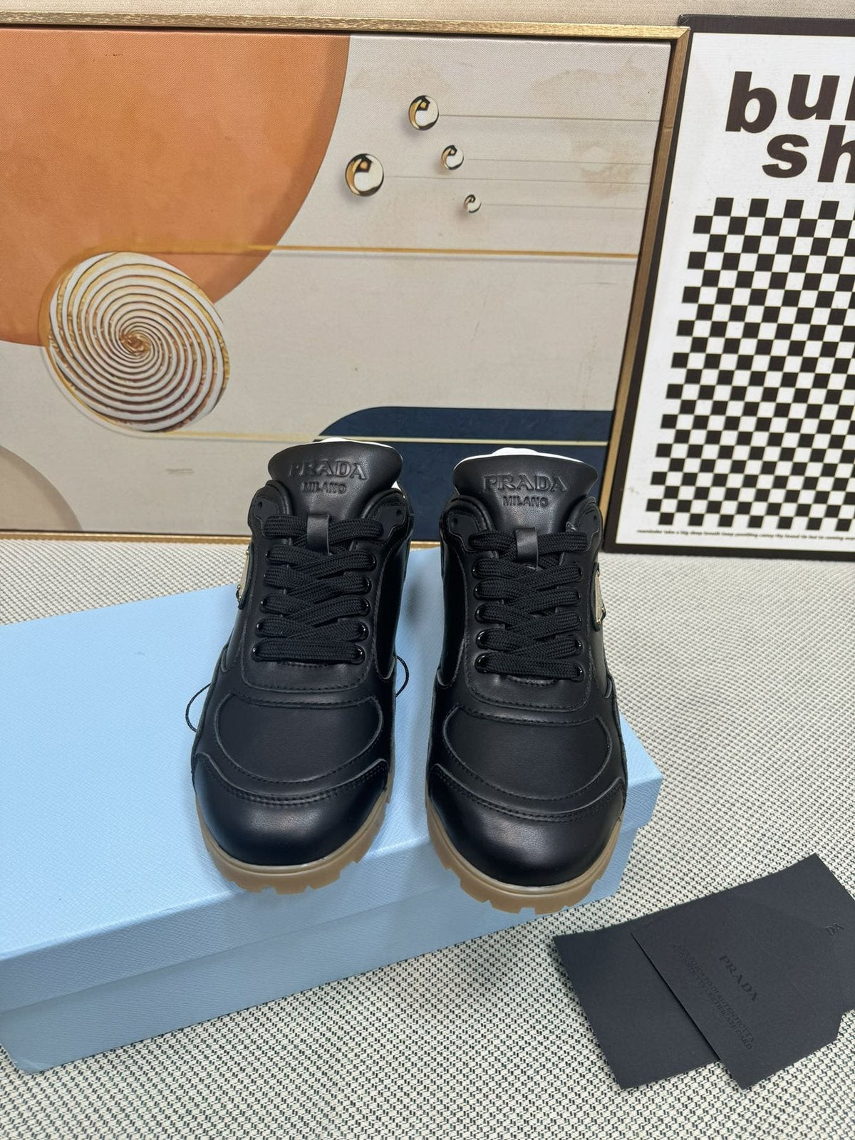 Prada Triangle Logo Low-Top Sneakers — front