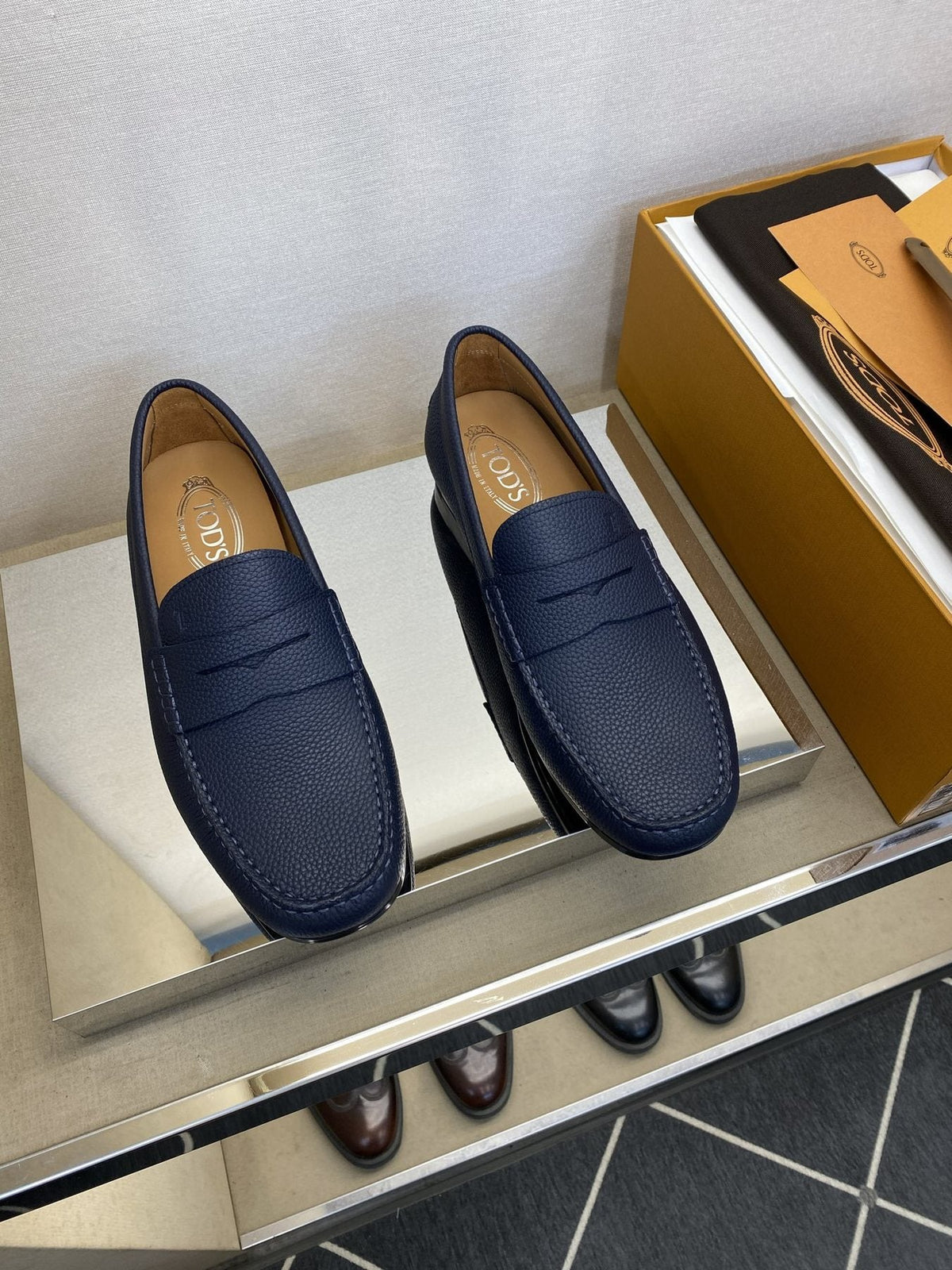 Tod's Textured Penny Loafers — front