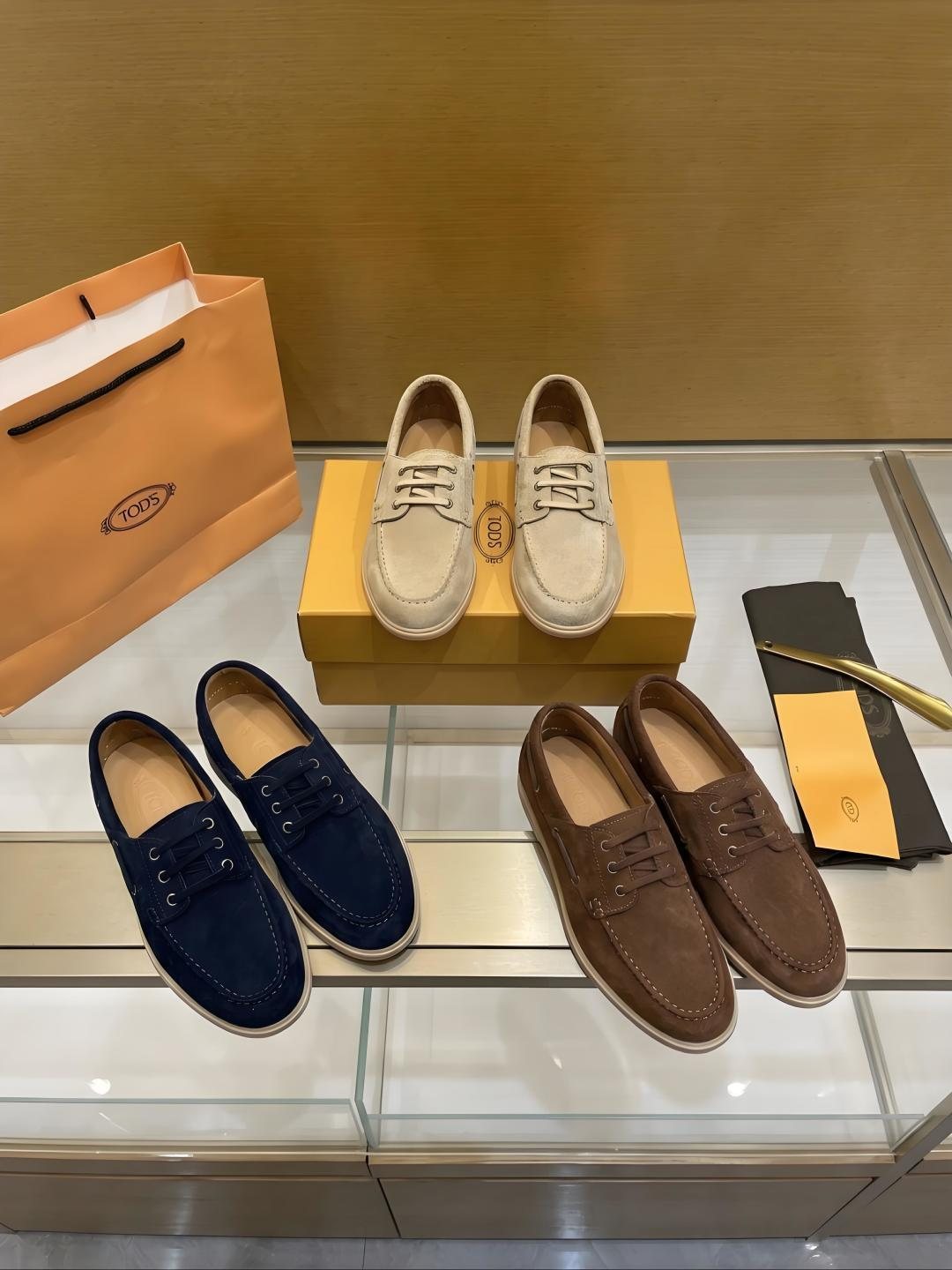 Tod's Navy Blue Boat Shoes — front