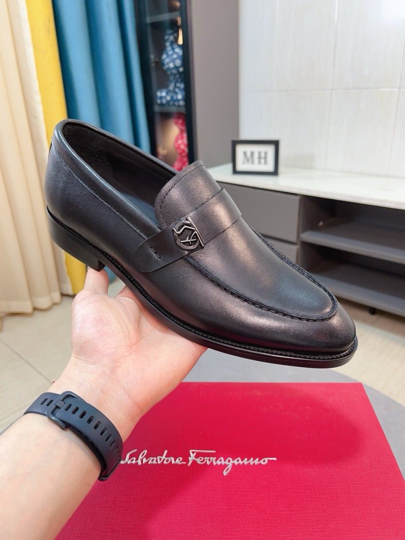Ferragamo Metal-Accent Moc-Toe Loafers — model