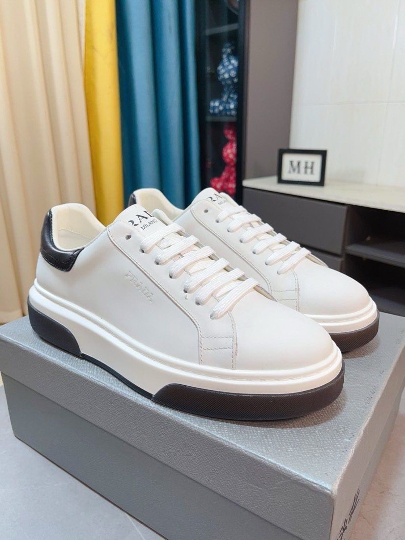 Prada Triangle Patch Low-Top Sneakers — front