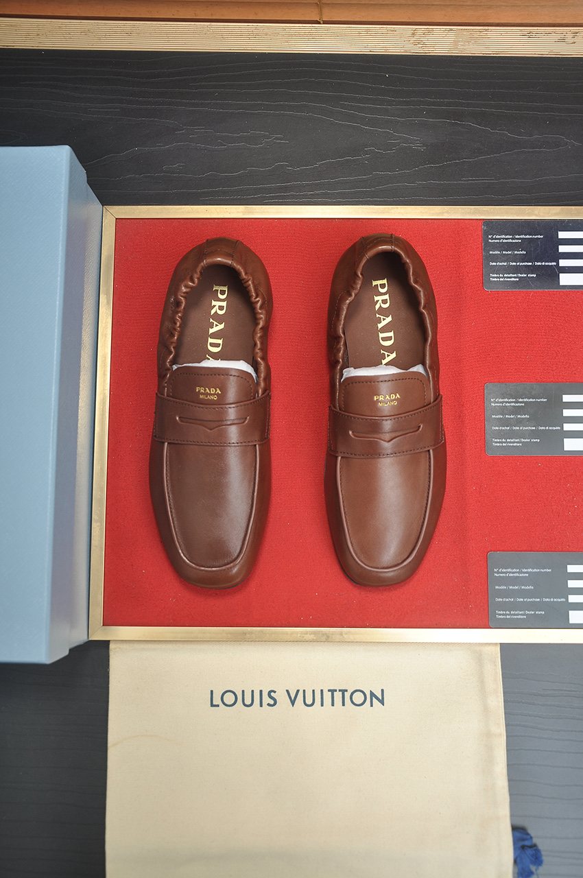 Prada Strap-Detail Slip-On Loafers — front